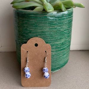 blue floral dangle earrings